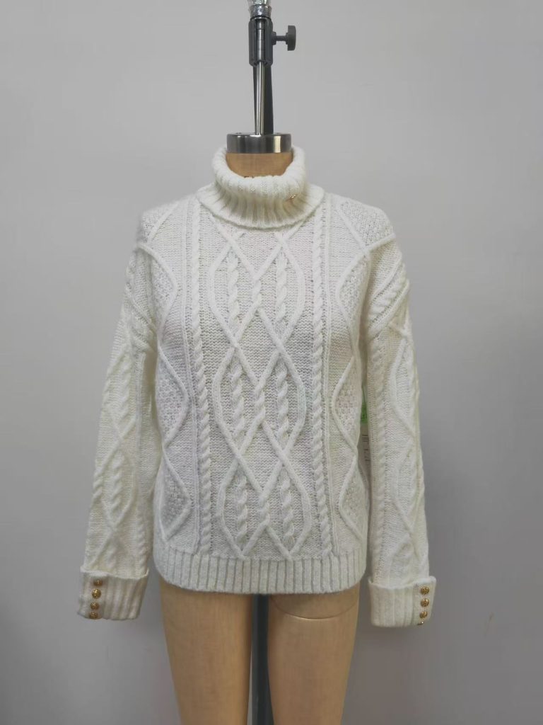 White turtleneck cable knit sweater on mannequin